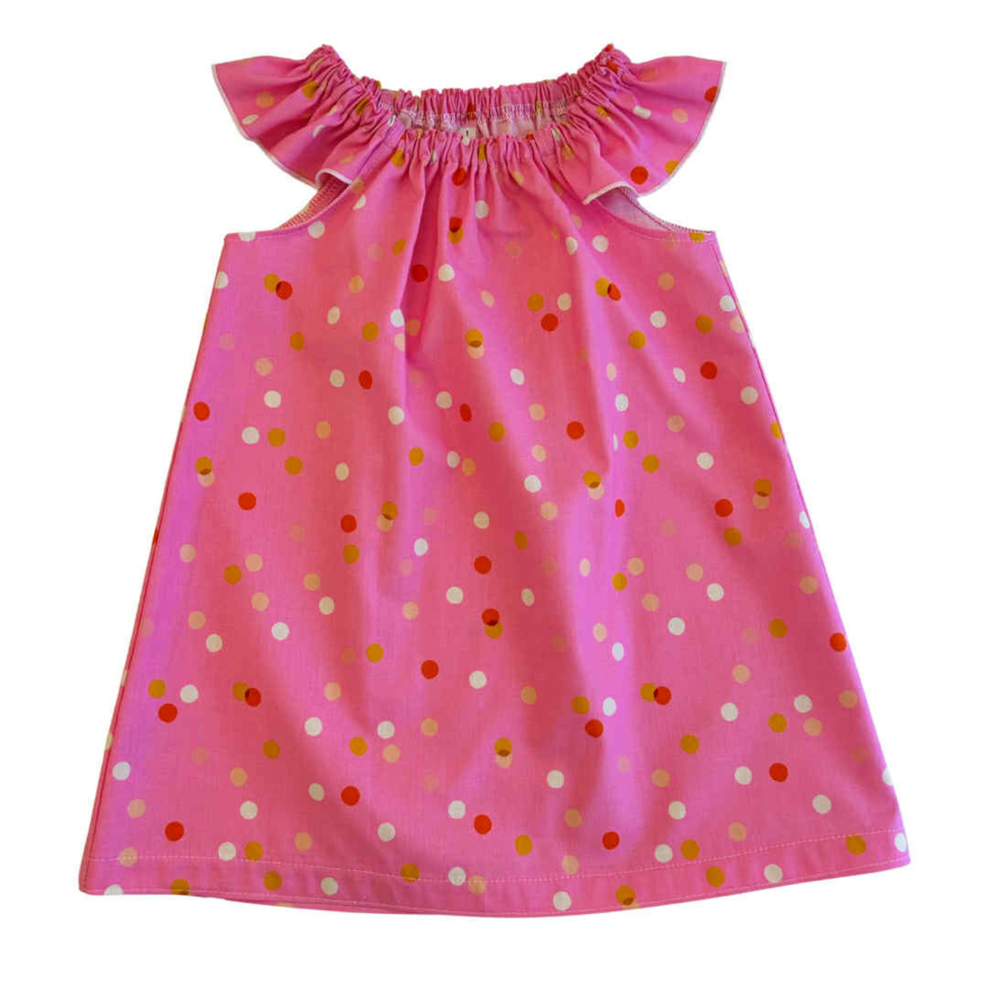 Pink dress with colorful polka dots