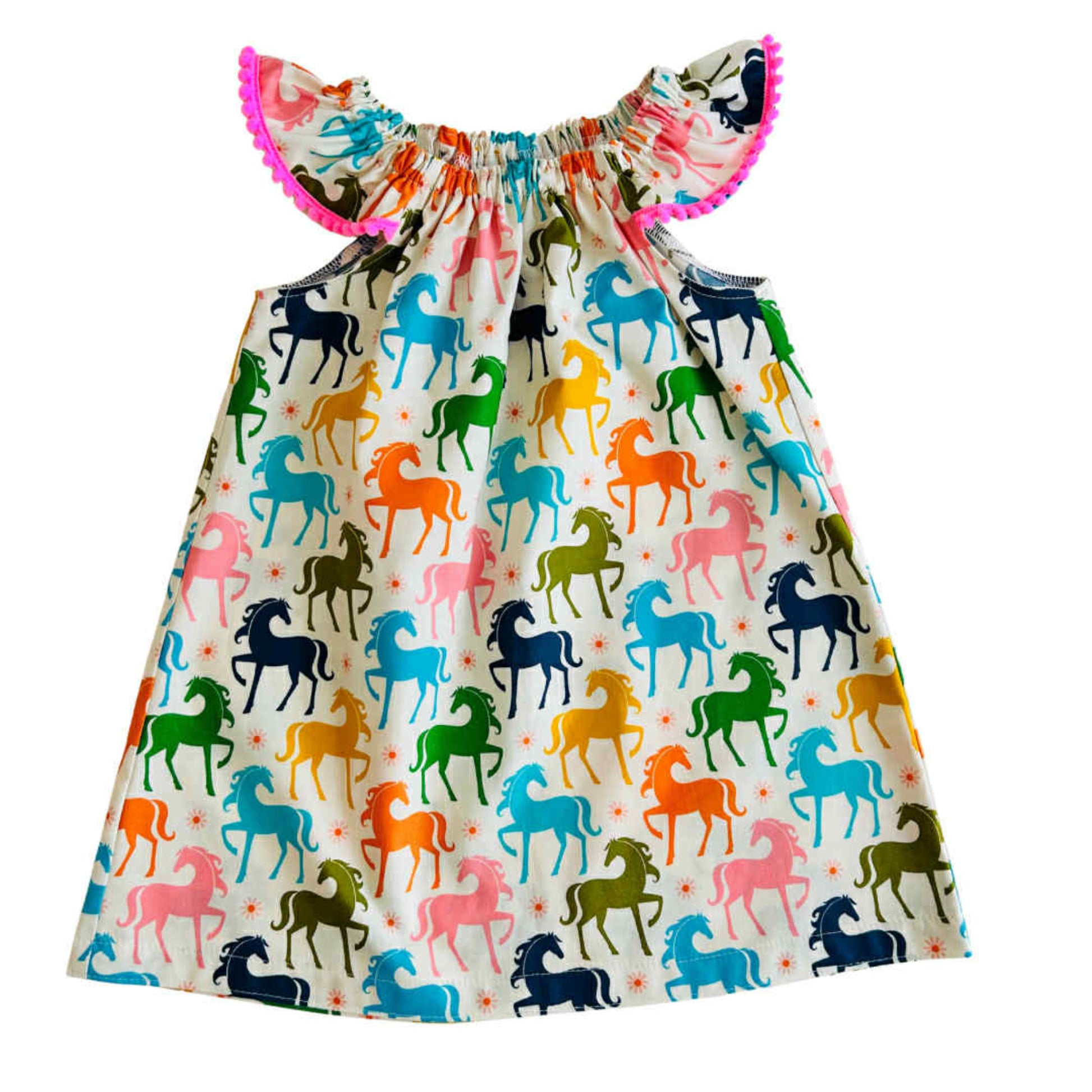 Dress with colorful horse pattern on a white background