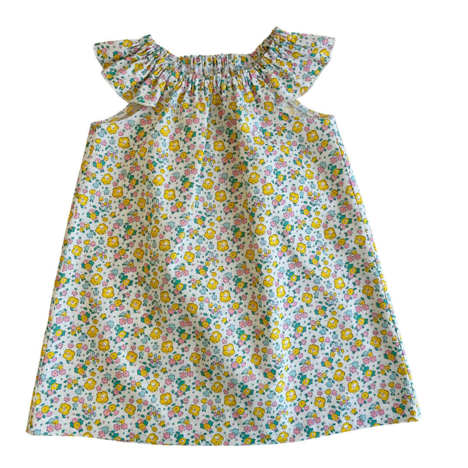 Floral patterned dress on a white background