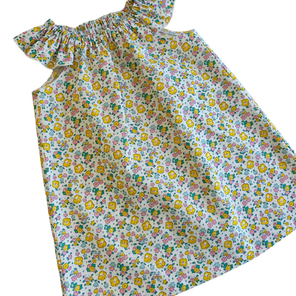 Floral dress with colorful pattern on a white background