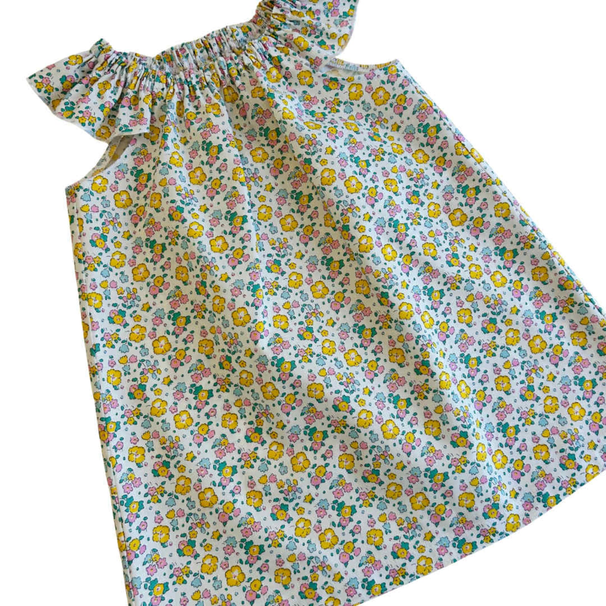 Floral dress with colorful pattern on a white background